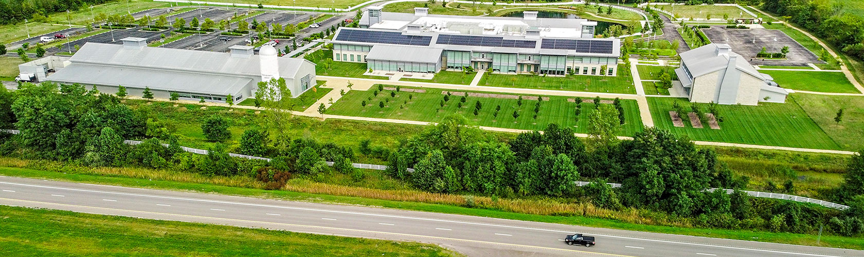 Aerial view of Thirty-One Gifts New Albany Ohio business location adjacent to four lane roadway.